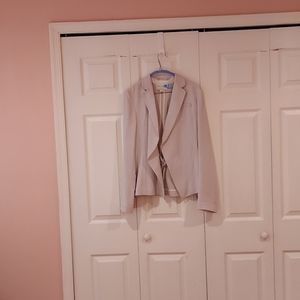 Jacket with back pleats